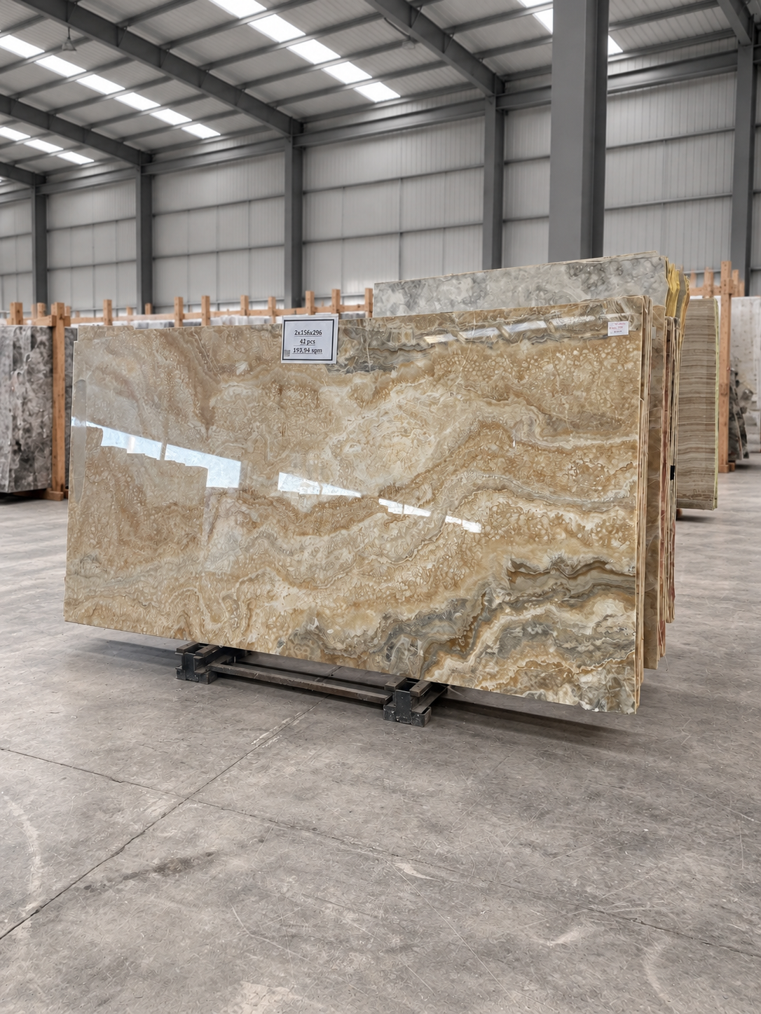 Gold Onyx bundle from an angle — warehouse background visualization