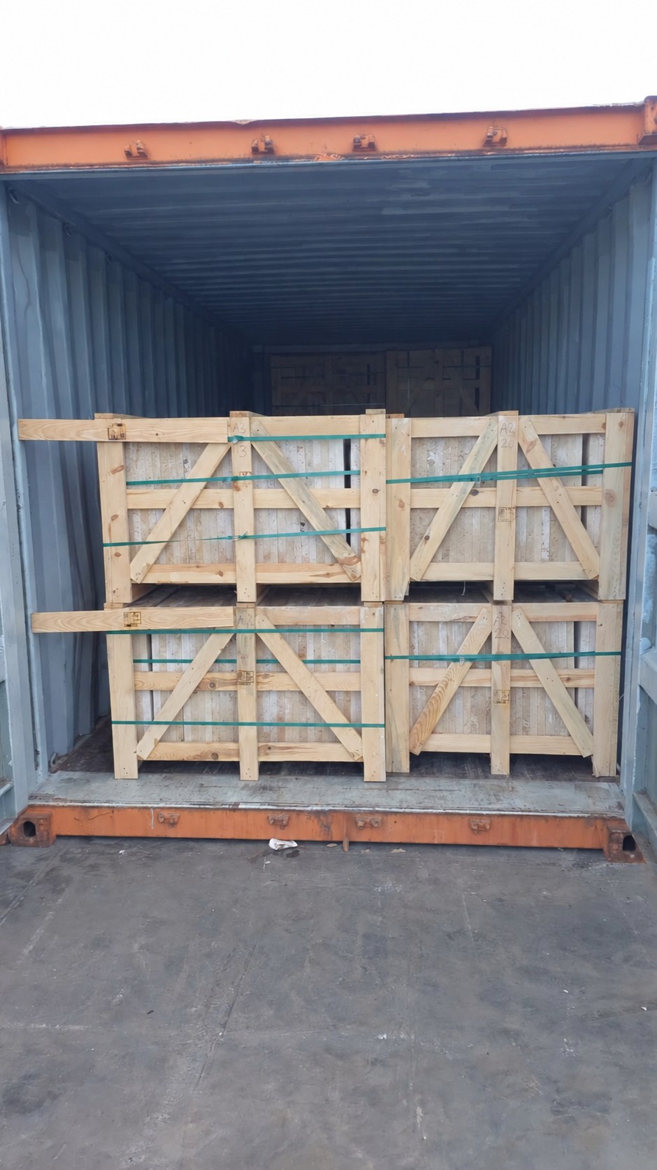 America shipment 11 — packed natural stone crates, container identification concealed